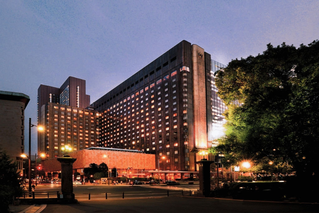 Evening view of the illuminated exterior of the Imperial Hotel Tokyo near Hibiya Park