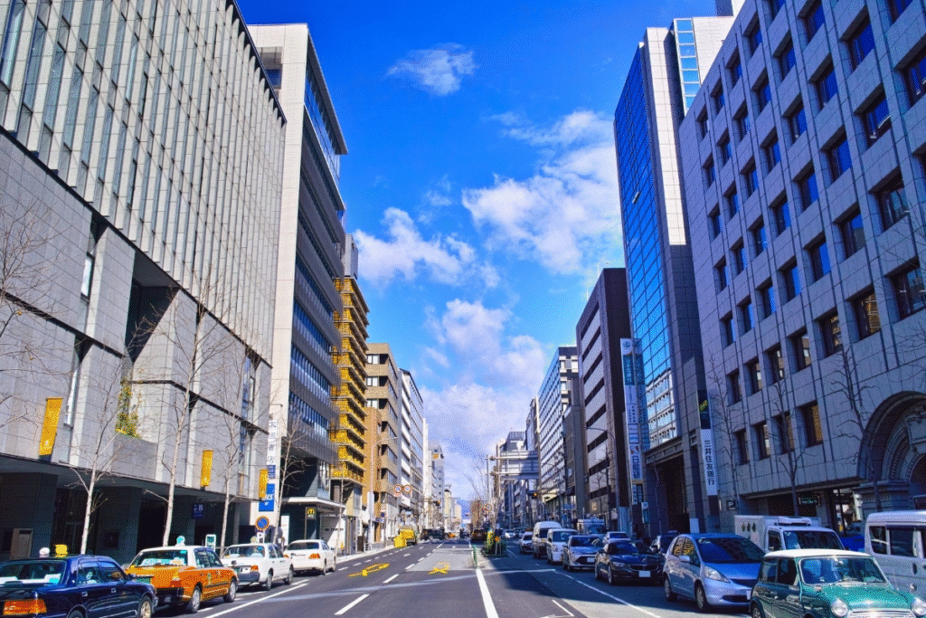Street view of Kyoto’s Shijo Karasuma business district on a sunny day.