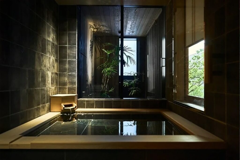 The private bath boasts natural hot spring water from Atami.