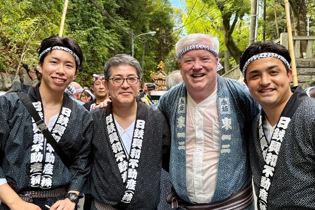 Sun Realty staff with US Ambassador to Japan George Glass at a local festival in Akasaka.